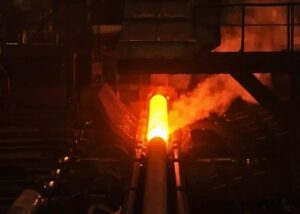 Aging heat treatment applied to long cylindrical alloy steel parts to enhance hardness and mechanical stability