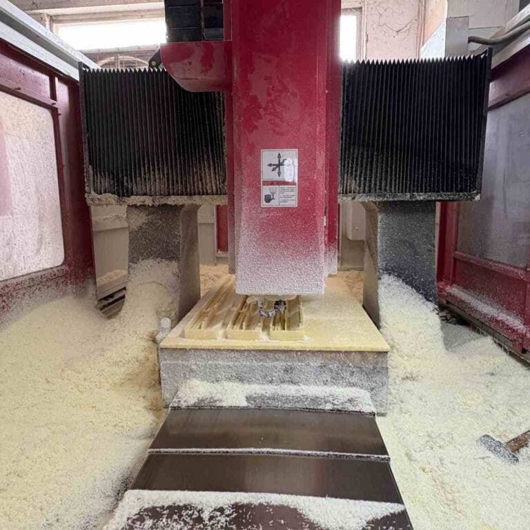 CNC machine processing a large POM air conditioner housing — an example of application of CNC machine for plastic parts