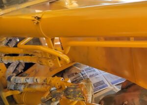 bright-yellow-pipeline-in-spray-painting-industrial-equipment-powder-coating-vs-paint