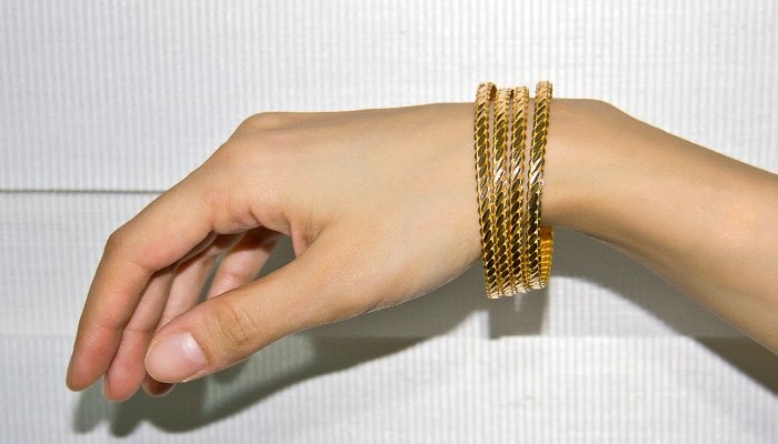 the-gold-bracelet-on-my-hand