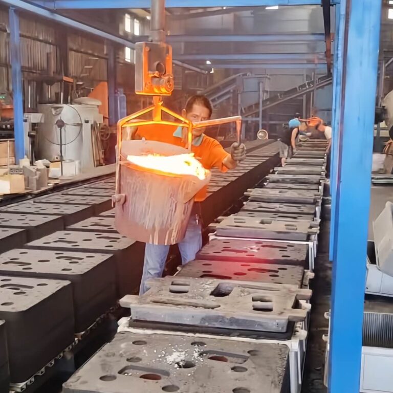 worker-operated-orange-glow-gravity-casting-process