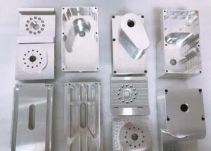 Finished aluminum parts with uniform surface finish and repeatability—showing CNC milling advantages