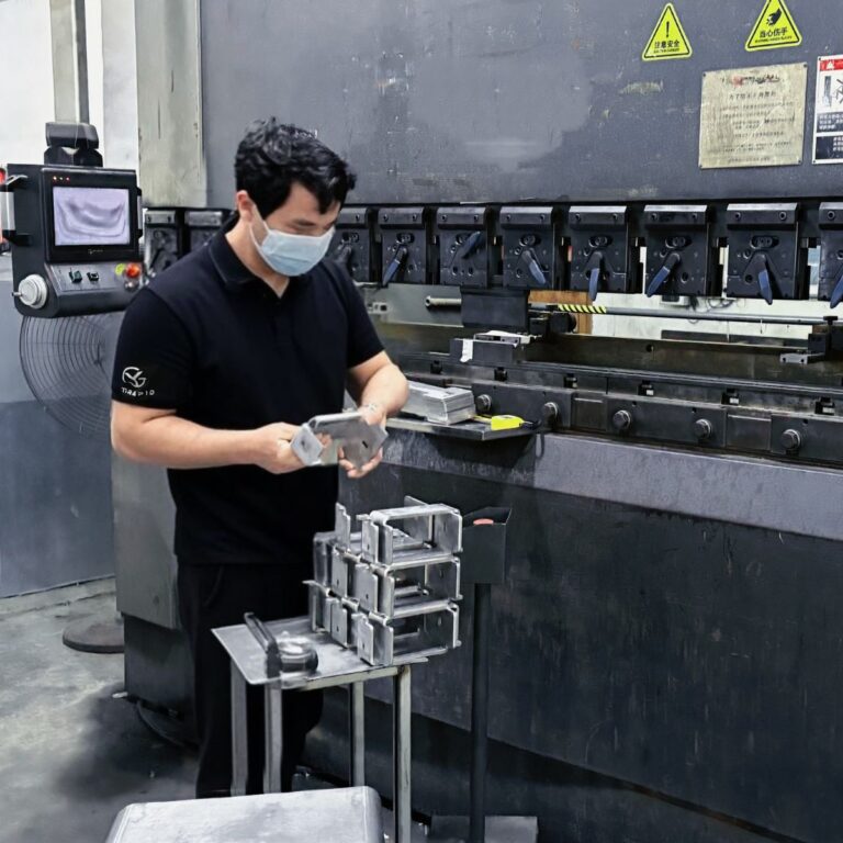 worker-operating-black-sheet-metal-bending-scene-picture