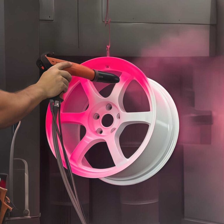 Powder coating process applied to a 5-axis CNC machined aluminum 6061 automotive part during production