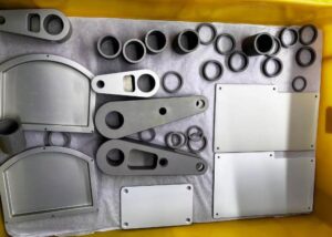 Aerospace aluminum components after chromic acid anodizing, corrosion-resistant surface