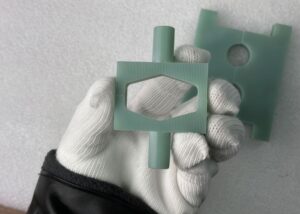 Image: Green fiberglass composites on display.