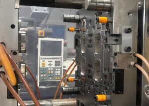 Insert molding process setup with injection molding machine
