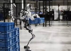 Humanoid Robots in Manufacturing performing logistics tasks with precision and efficiency