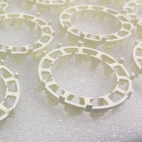 SLA 3D printing prototypes of nylon rings undergoing post-processing at TiRapid’s rapid prototyping workshop.
