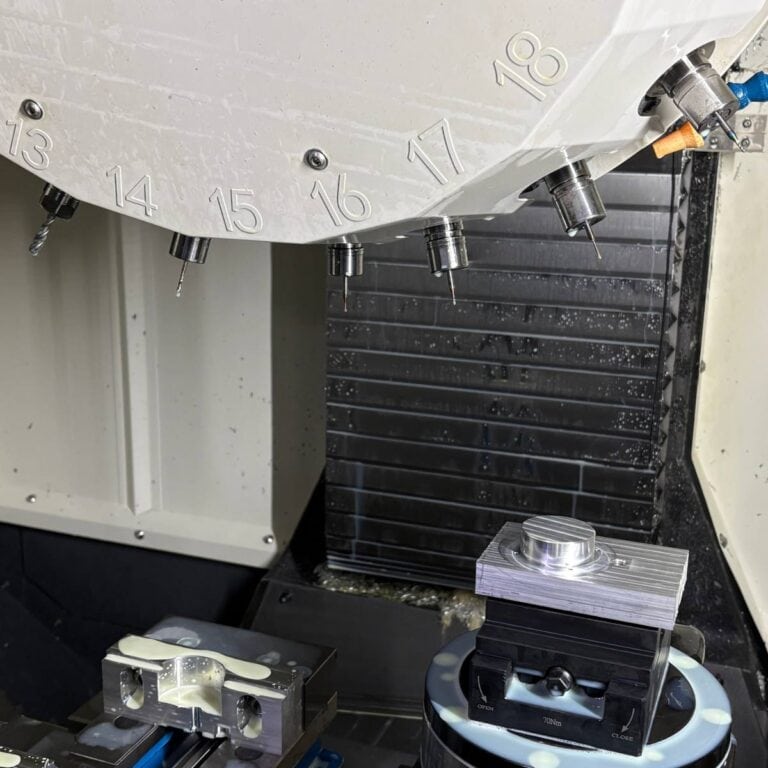 High-precision CNC milling center cutting aluminum components for manufacturing