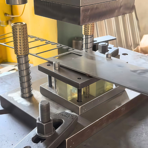 Compound stamping press performing blanking, piercing, and forming in one precise stroke