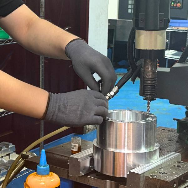Precision drilling and tapping ensure tight fits and clean internal threads in TiRapid’s screw machining services