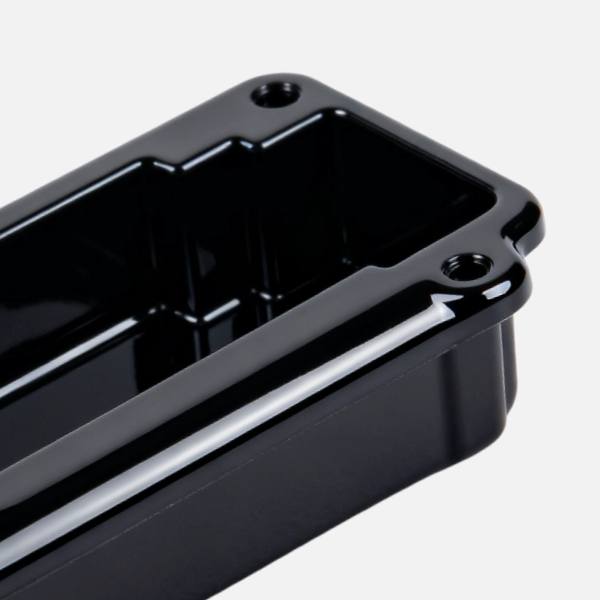 Rectangular plastic injection moulding part with SPI finishes, showing high-gloss and smooth surface texture