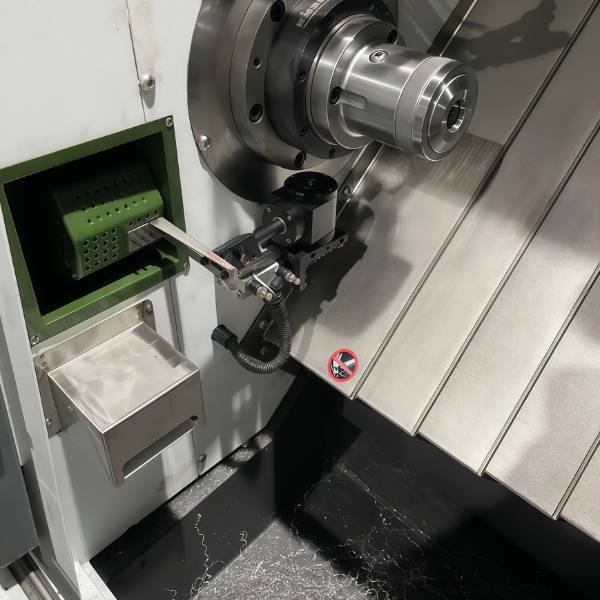 CNC lathe with automatic bar feeding for high-volume metal turning production