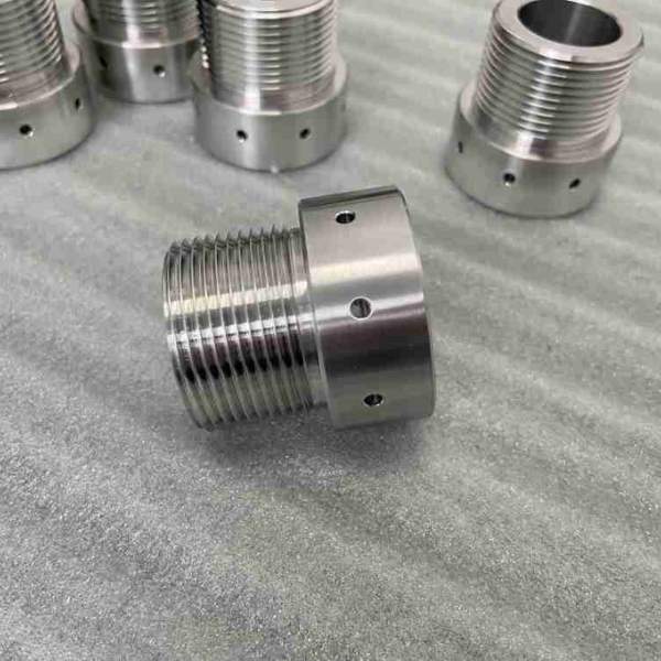 Stainless steel screw machining threaded adapter used in Chinese automation equipment, with precision holes and CNC lathe production by professional machine shops