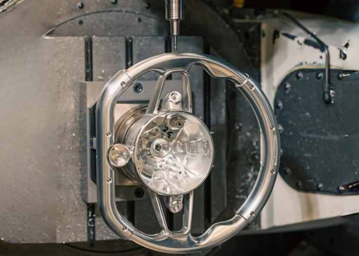 5-axis machined 6061 aluminum quick-release racing steering wheel in production