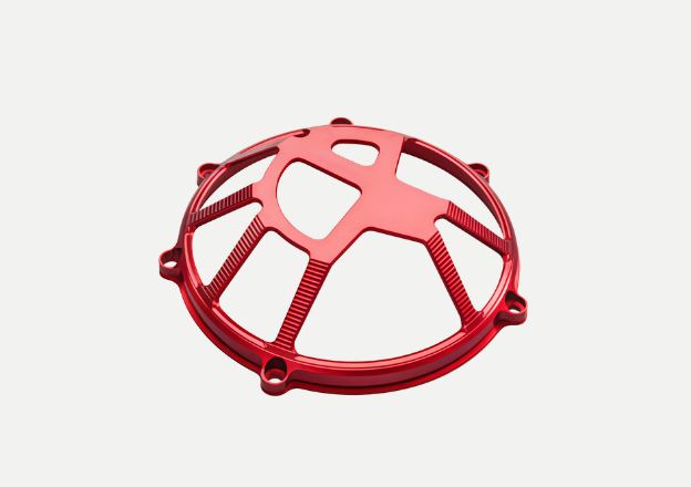 CNC-milled aluminum engine guard and chassis protection frame for racing durability