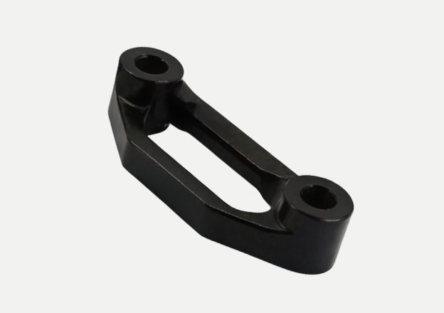 Steel CNC-milled control arm and steering linkage for high-performance racing suspension