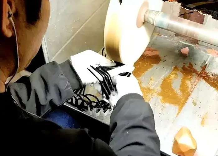 Mechanical polishing process applied to CNC PC parts to improve surface smoothness and clarity