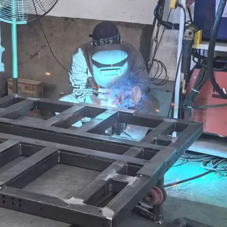 Metal fabrication process with welding on sheet metal components
