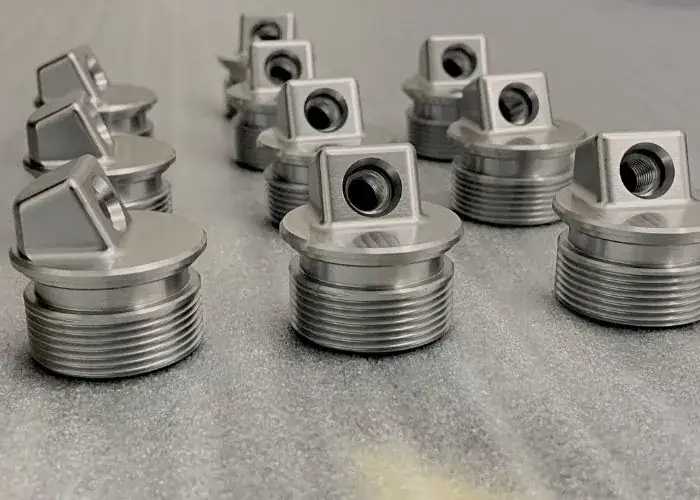 precision machined components with various hole types
