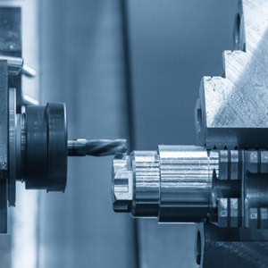 This is a photo of precision machining on a CNC lathe.