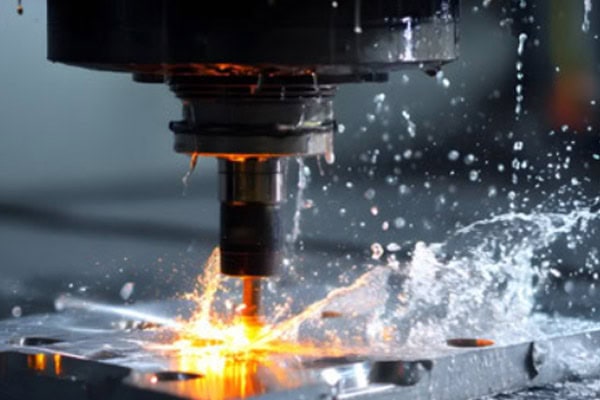 This is a picture of metal cutting in a CNC machining center.