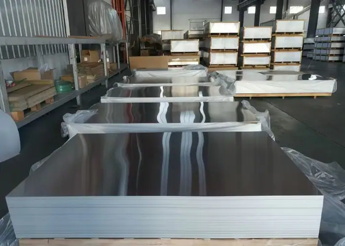 Aluminum 5083 plate stock stacked in warehouse for industrial applications