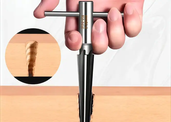 Hand reaming of tapered hole with T-handle taper reamer
