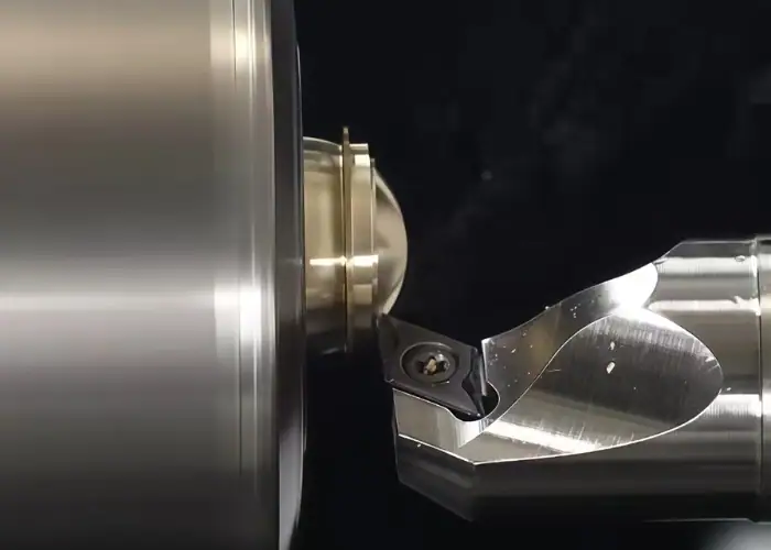 Turning insert with controlled rake angle during CNC finish turning