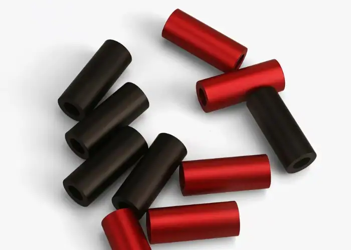 Red and black anodized aluminum spacers with smooth surface finish