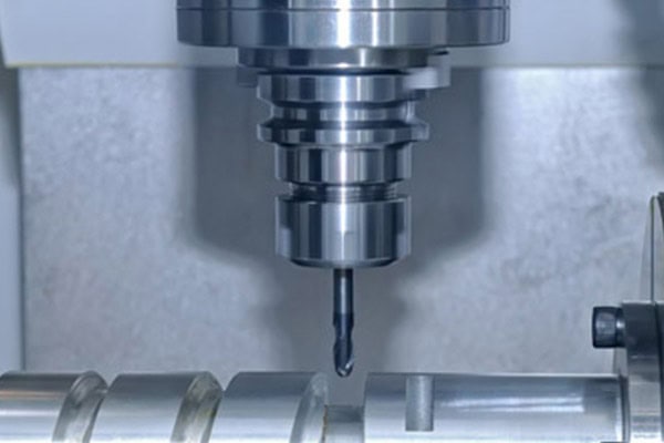 Images of precision machining on a turning machining center.