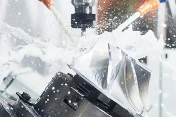 Image of a machine tool spindle performing milling on a metal workpiece.