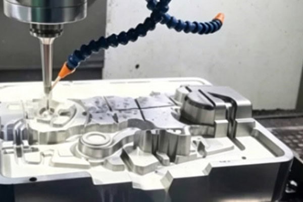 Images of machine tool spindles machining mold cavities.