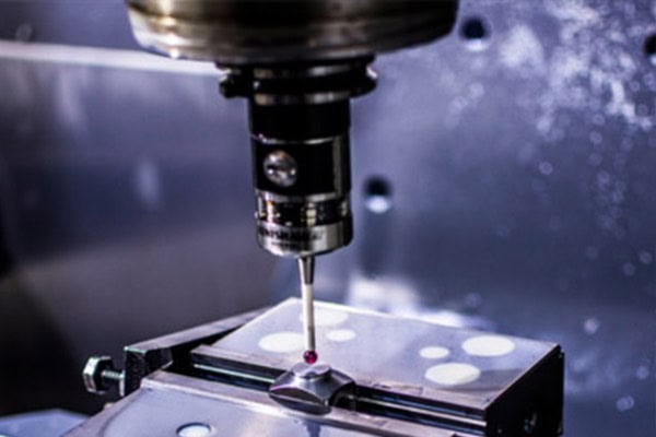 Images of workpiece inspection using contact probes.