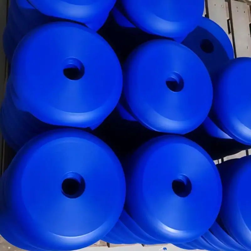 Blue MC Nylon rods showing the material form used for durable industrial CNC machined parts