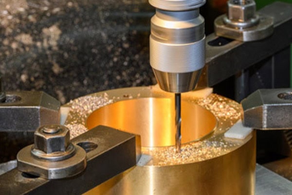 Images of drilling operations on a conventional milling machine.
