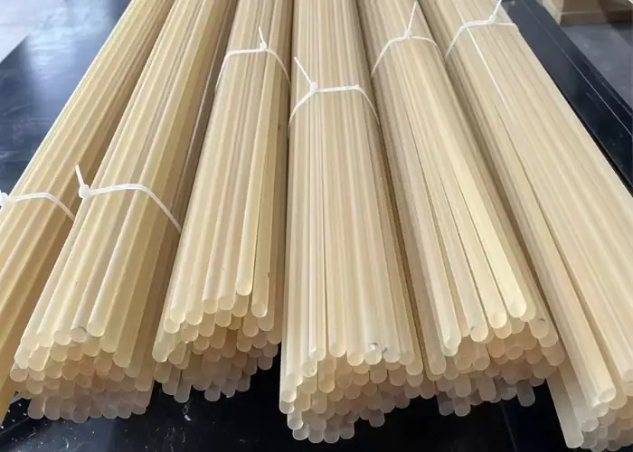 Polysulfone rods shown as raw material for a high-performance plastic material overview
