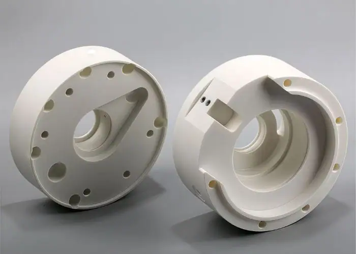 PTFE round housing assembly for chemical-resistant and low-friction precision plastic components