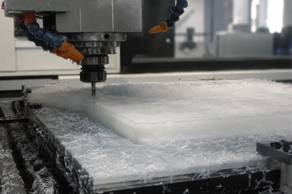 CNC milling in action with plastic