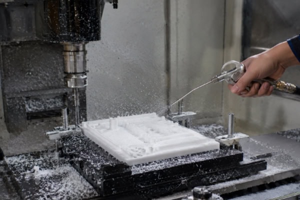 Cleaning plastic processing debris