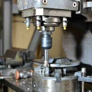 High-speed spindle rotation for cutting metal.