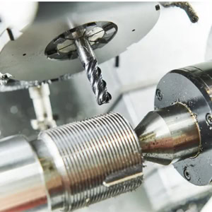 Precision machining on a CNC milling and turning machine tool.