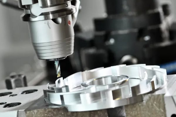 Images of CNC machining center precision milling of aluminum alloy.