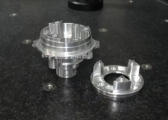 CNC machined automotive aluminum parts used in a Delrin vs aluminum material comparison