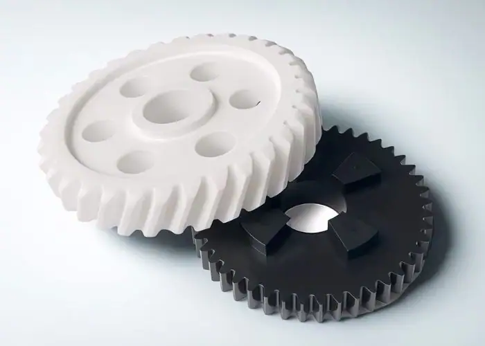 Delrin vs UHMW round housing assembly for precision plastic material comparison and custom machined parts