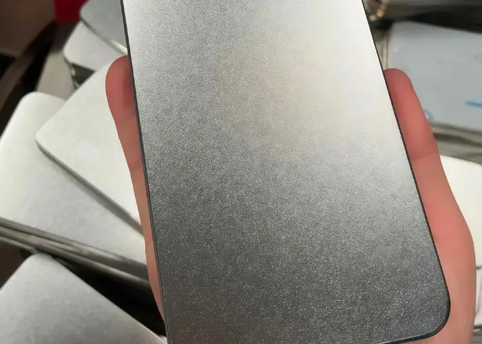 Batch-finished aluminum rounded rectangular plates with a matte bead-blasted surface produced by precision CNC machining.