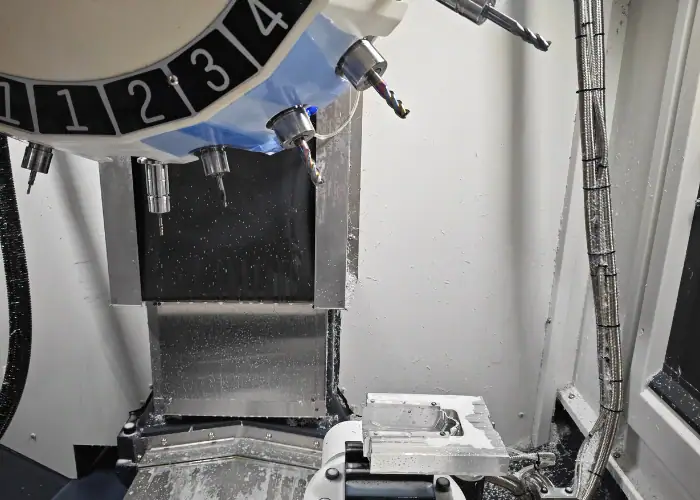 CNC machining center tool changer controlled by G Code commands