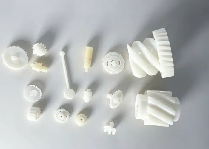 Custom plastic gears and precision molded components in multiple sizes