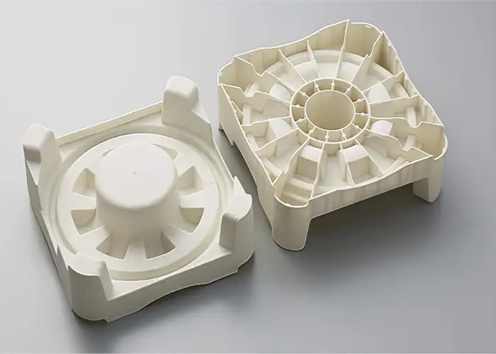 Injection molded plastic parts with ribs and structural features